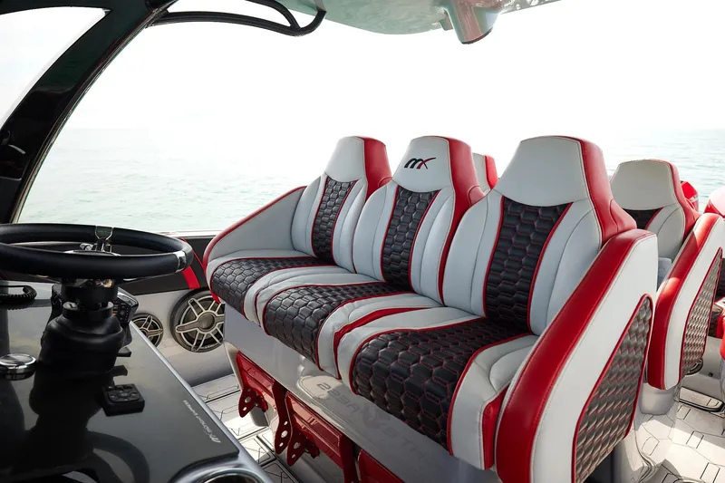  Yacht Photos Pics Luxurious interior of 2025 Midnight Express 37' Open boat with stylish seating.
