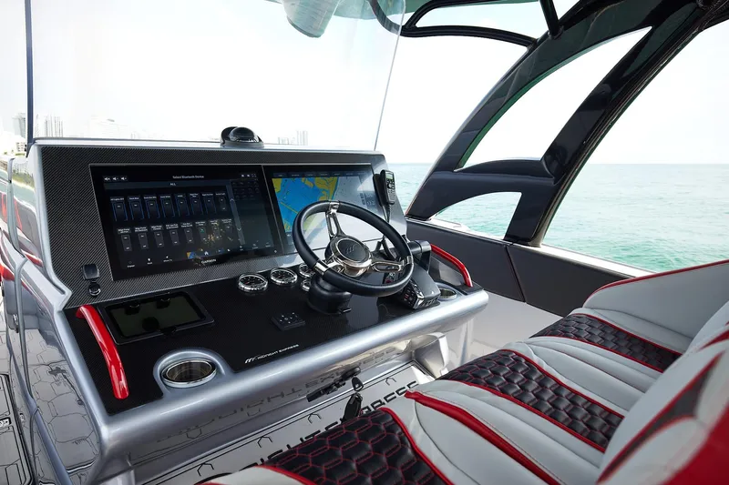  Yacht Photos Pics Helm of 2025 Midnight Express 37' Open boat with advanced navigation system.