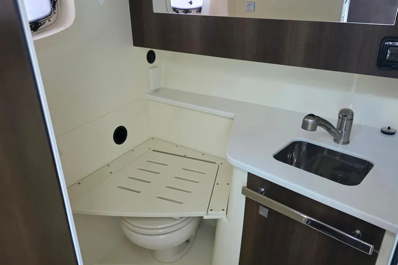  Yacht Photos Pics 2017 Monterey 360 Sport Coupe bathroom with sink and toilet.
