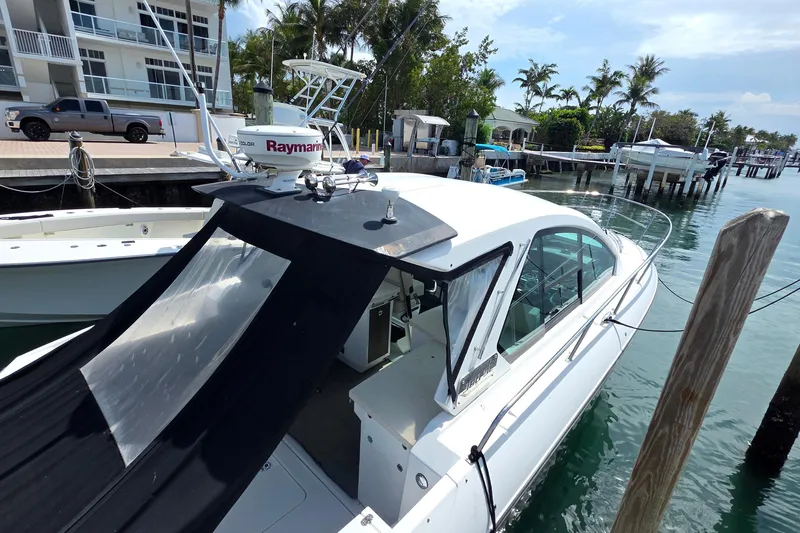  Yacht Photos Pics 2017 Monterey 360 Sport Coupe docked at marina with Raymarine equipment.