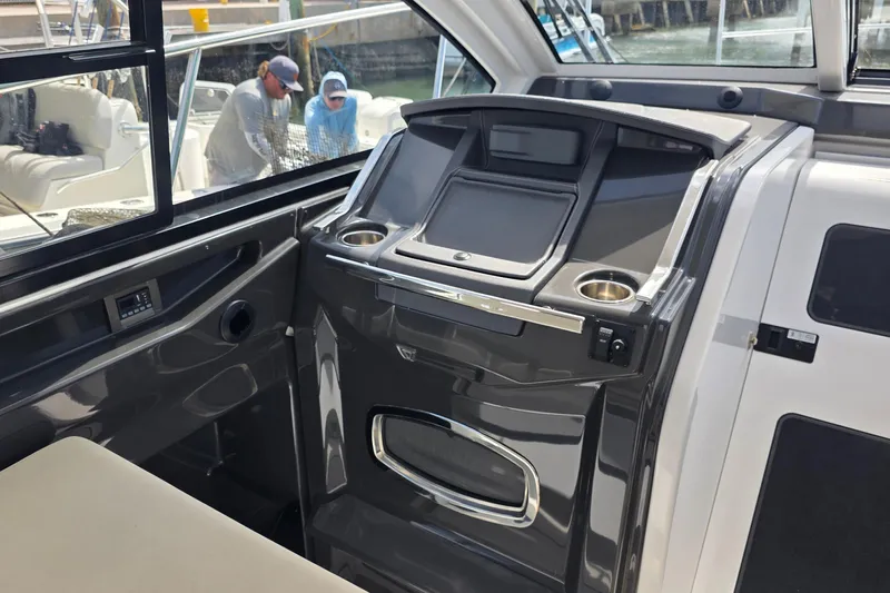  Yacht Photos Pics Interior of a 2017 Monterey 360 Sport Coupe boat with sleek dashboard design.