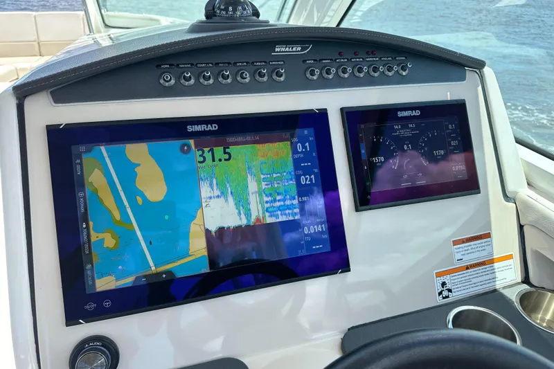  Yacht Photos Pics Helm of 2023 Boston Whaler 320 Vantage with Simrad navigation displays.