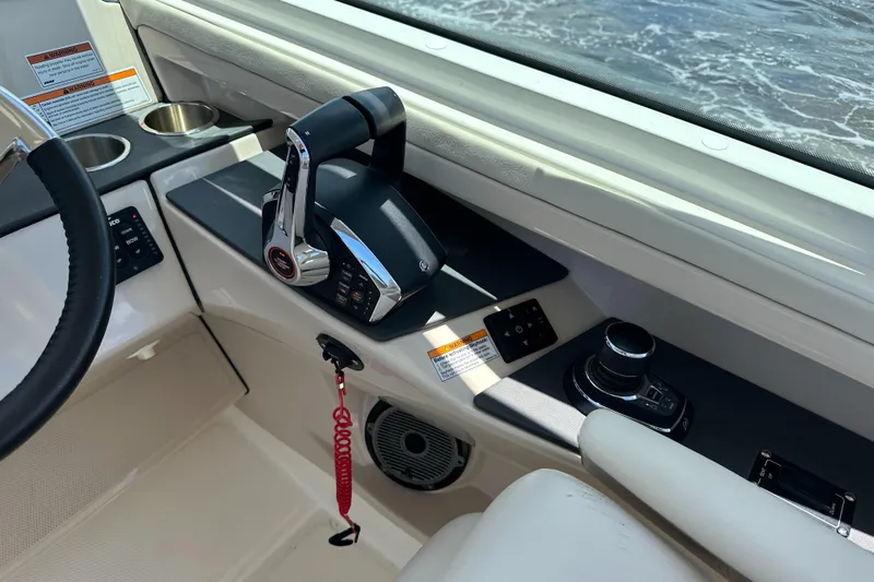  Yacht Photos Pics 2023 Boston Whaler 320 Vantage helm with controls and ocean view.