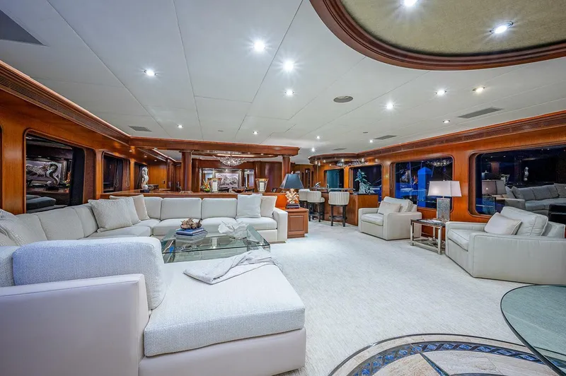 La Sirena Yacht Photos Pics Luxurious interior of 2000 Christensen 141 Raised Pilothouse yacht with elegant seating and lighting.