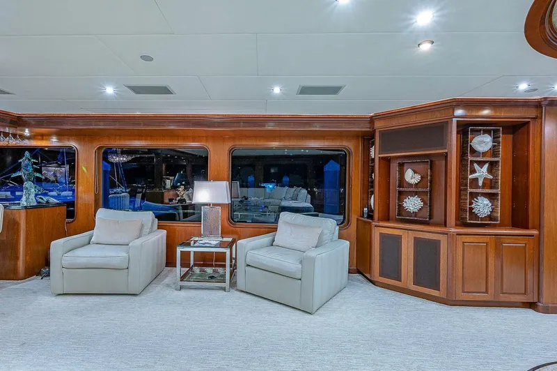 La Sirena Yacht Photos Pics Luxurious interior of 2000 Christensen 141 Raised Pilothouse yacht with elegant seating and decor.