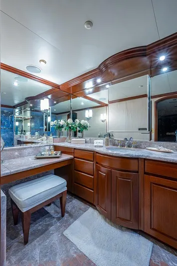 La Sirena Yacht Photos Pics Luxurious bathroom in 2000 Christensen 141 Raised Pilothouse yacht with elegant wood cabinetry.