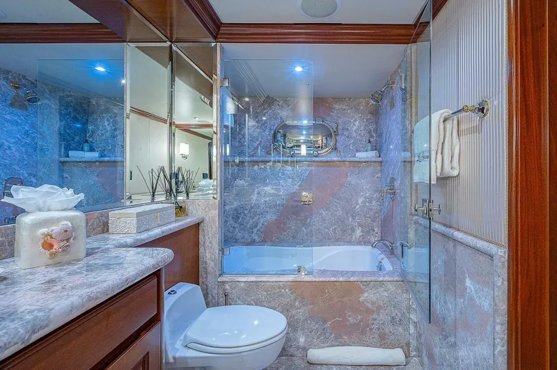 La Sirena Yacht Photos Pics Luxurious bathroom with marble decor on Christensen 141 Raised Pilothouse yacht, 2000 model.