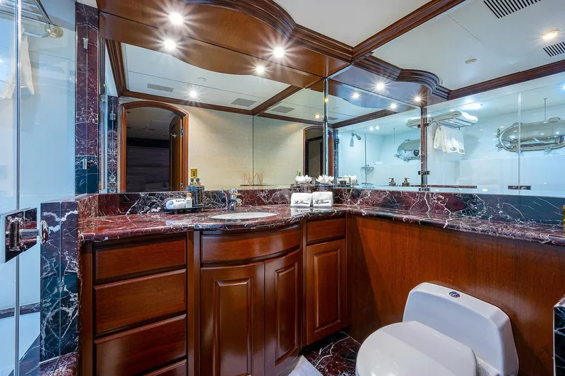 La Sirena Yacht Photos Pics Luxurious yacht bathroom with marble countertops and wooden cabinetry, Christensen 141 Raised Pilothouse, 2000.