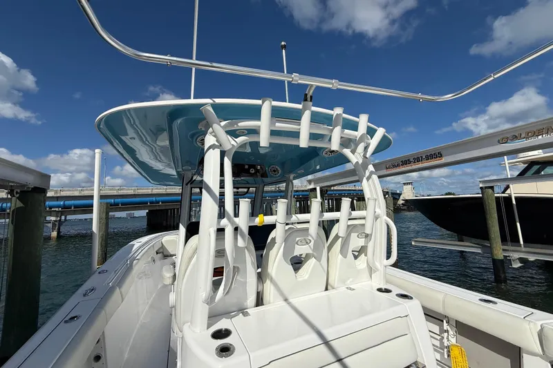  Yacht Photos Pics 2020 Sportsman Open 352 Center Console boat docked under blue sky.