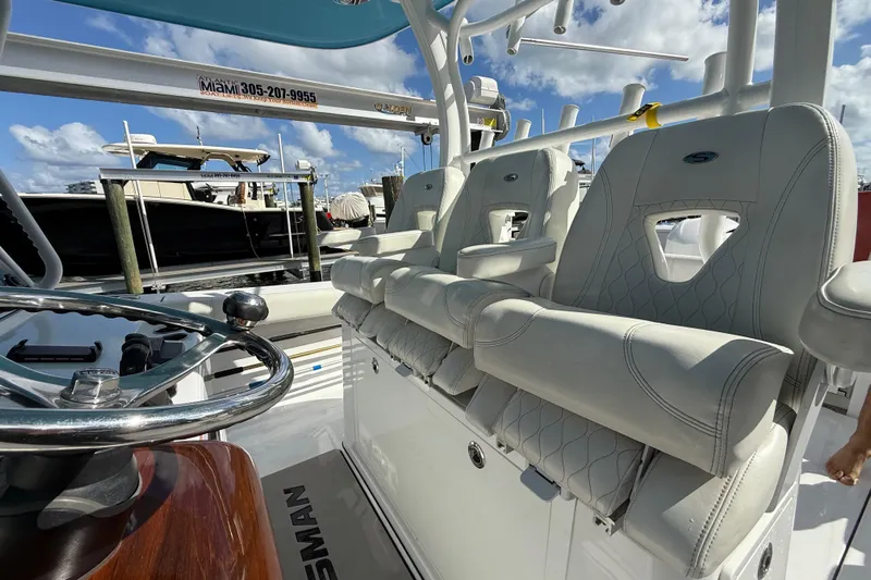  Yacht Photos Pics 2020 Sportsman Open 352 Center Console boat interior with luxury seating and steering wheel.