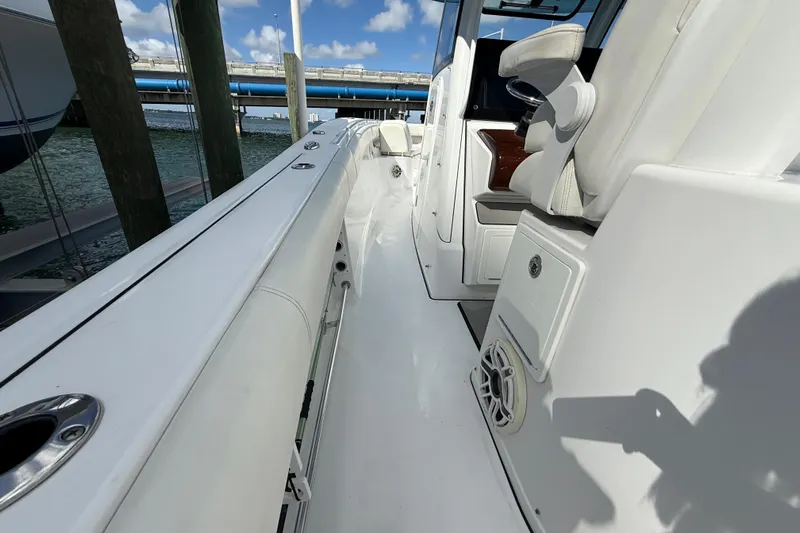  Yacht Photos Pics 2020 Sportsman Open 352 Center Console boat interior with seating and storage.