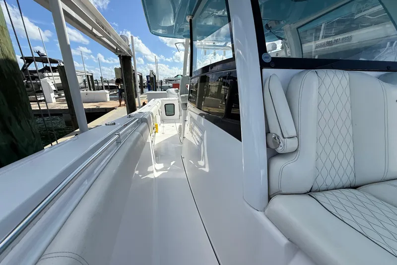  Yacht Photos Pics 2020 Sportsman Open 352 Center Console boat with white seating and sleek design.