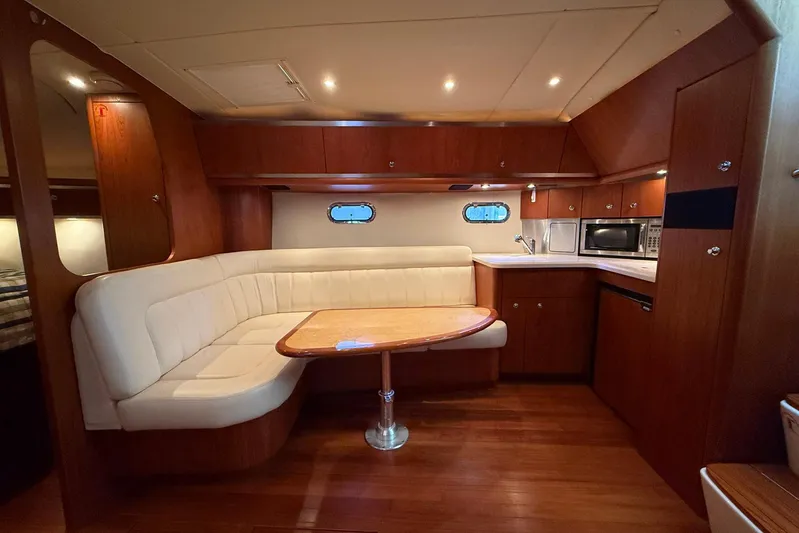 Blue Skys Yacht Photos Pics Luxurious 2005 Tiara Yachts 3600 Sovran interior with elegant seating and modern kitchen amenities.