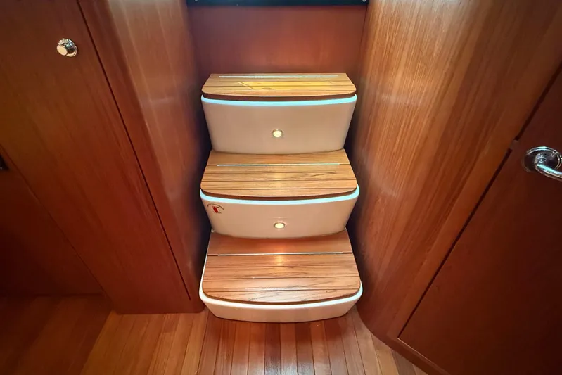 Blue Skys Yacht Photos Pics Wooden steps with lighting inside a 2005 Tiara Yachts 3600 Sovran.