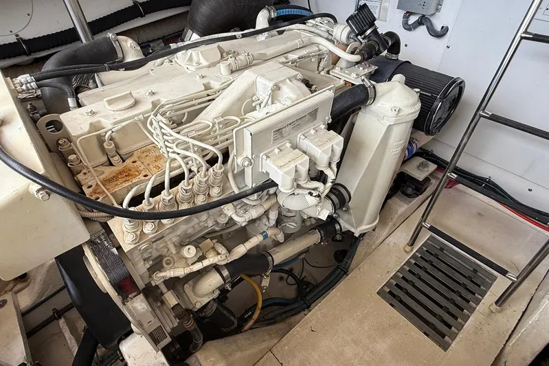 Blue Skys Yacht Photos Pics Engine room of 2005 Tiara Yachts 3600 Sovran, showcasing detailed mechanical components.