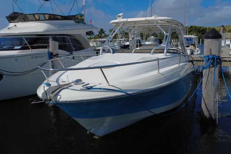  Yacht Photos Pics 2008 Hydra-Sports Vector 3300 VX boat docked at marina under clear blue sky.