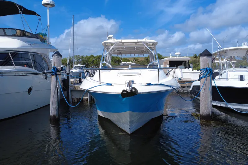 Yacht Photos Pics 2008 Hydra-Sports Vector 3300 VX boat docked at marina under blue sky.