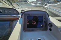Control panel of a 2008 Nimbus 27 Nova S boat with navigation display.