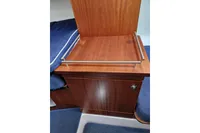 Wooden interior detail of a 2008 Nimbus 27 Nova S boat cabin.
