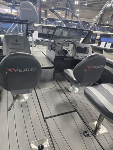 2024 Vexus ADX180 boat interior with steering console and seating.