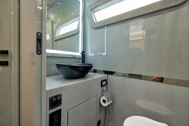  Yacht Photos Pics Modern bathroom interior in 2025 Midnight Express 52' Vitesse yacht.