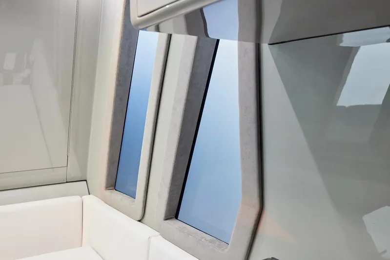  Yacht Photos Pics Interior view of 2025 Midnight Express 52' Vitesse yacht with sleek windows and modern design.
