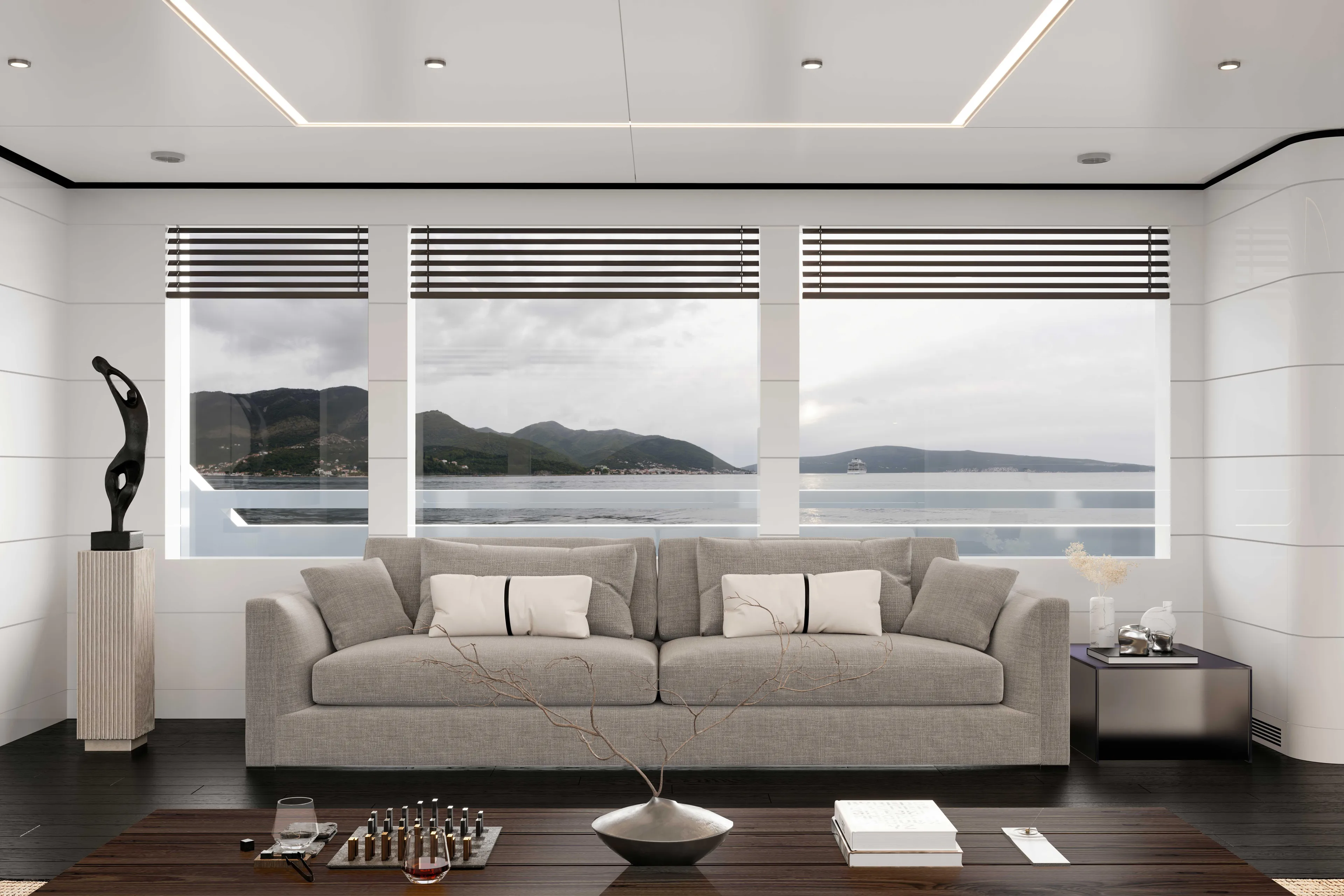 Mako Shark Yacht Photos Pics Luxurious yacht interior with modern sofa, large windows, and scenic ocean view.