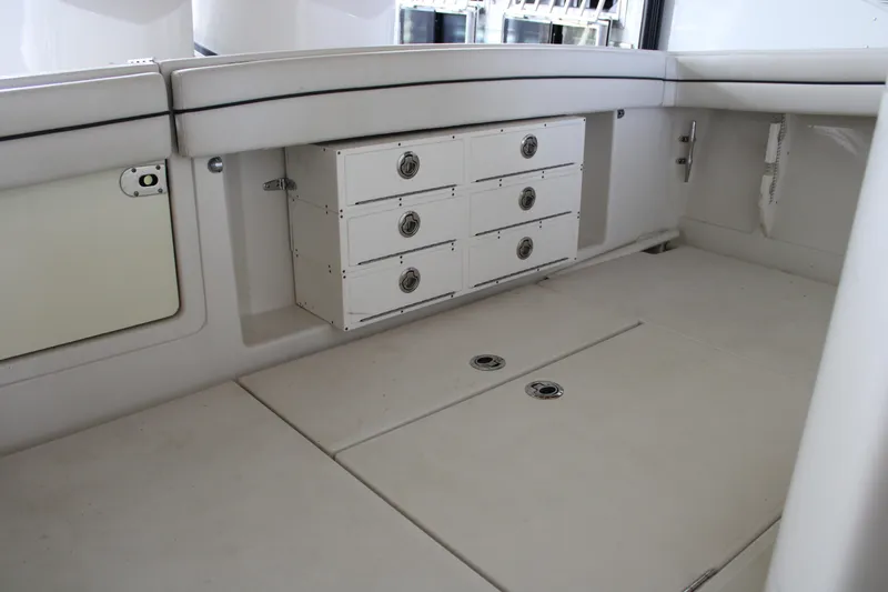  Yacht Photos Pics 2018 Jupiter 30 HFS boat interior with storage compartments and seating area.