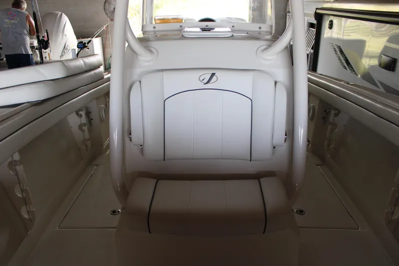  Yacht Photos Pics Interior of a 2018 Jupiter 30 HFS boat, featuring white seating and sleek design.