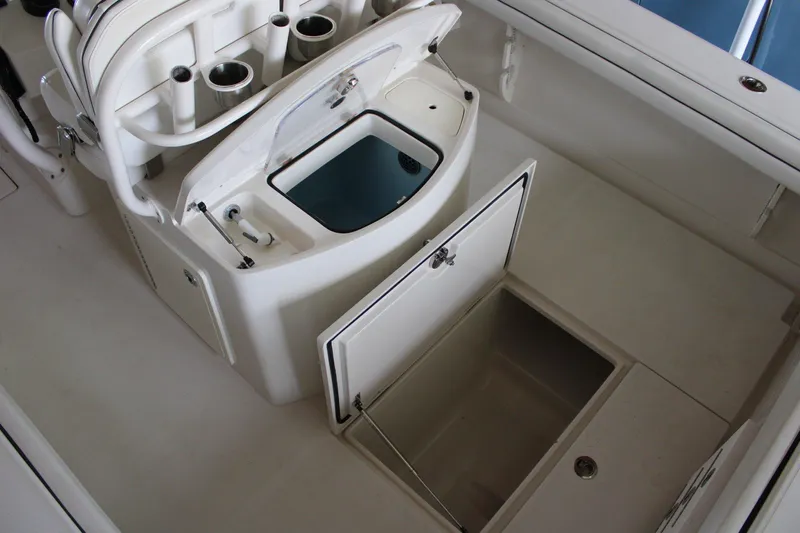  Yacht Photos Pics 2018 Jupiter 30 HFS boat interior with storage compartments and rod holders.