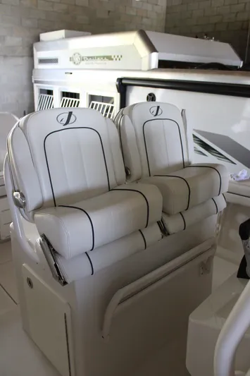  Yacht Photos Pics 2018 Jupiter 30 HFS boat with white cushioned seats in a sleek, modern design.