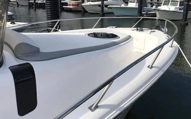  Yacht Photos Pics 2020 Belzona 27 Walkaround boat docked in marina, sleek white design.