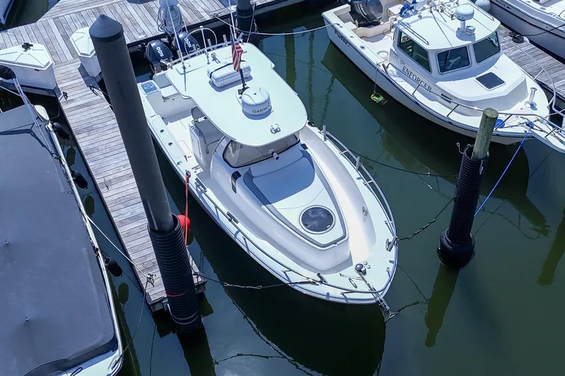  Yacht Photos Pics 2020 Belzona 27 Walkaround boat docked at marina, aerial view.