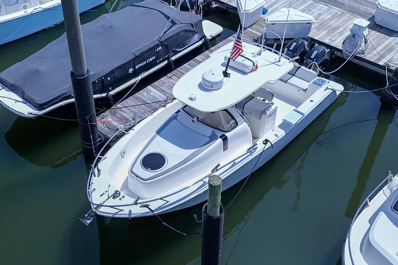  Yacht Photos Pics 2020 Belzona 27 Walkaround boat docked at marina, aerial view.