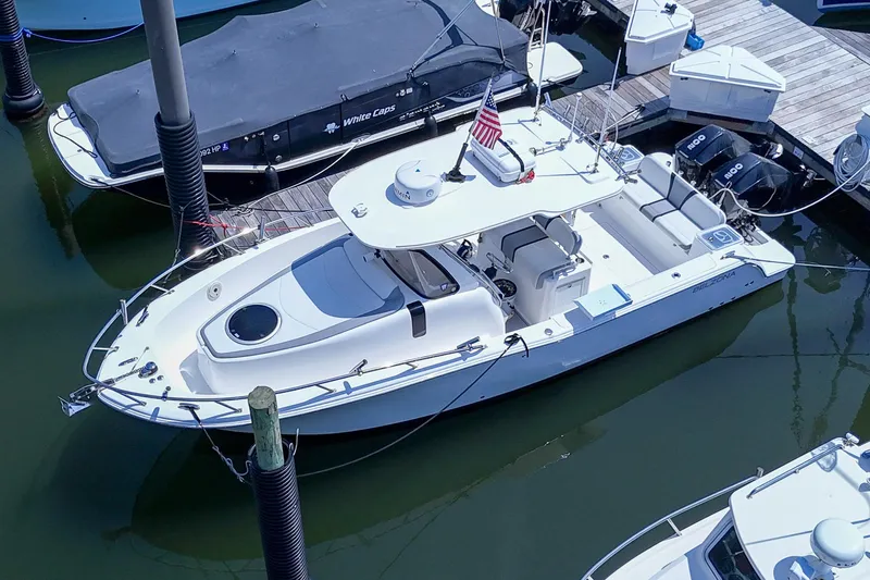  Yacht Photos Pics 2020 Belzona 27 Walkaround boat docked in marina, aerial view.