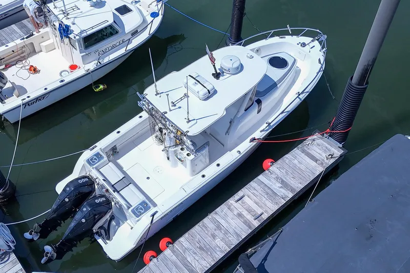  Yacht Photos Pics 2020 Belzona 27 Walkaround boat docked with twin engines, aerial view.