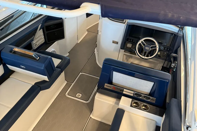  Yacht Photos Pics Interior of a 2020 Cobalt A29 boat with blue and white seating.
