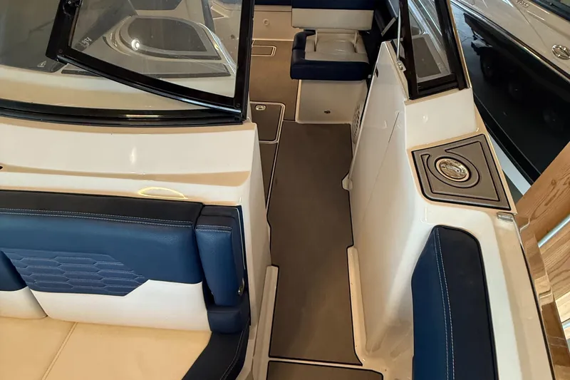  Yacht Photos Pics Interior of a 2020 Cobalt A29 boat with blue and white seating.