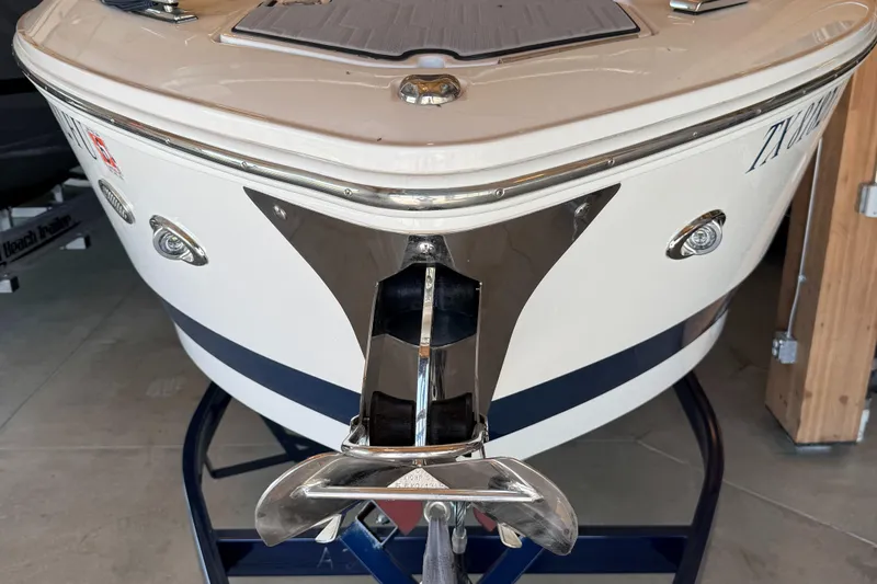  Yacht Photos Pics 2020 Cobalt A29 boat bow with anchor, displayed indoors on a stand.