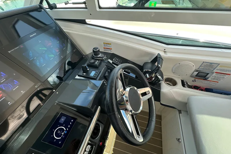  Yacht Photos Pics 2023 Formula 430 All Sport Crossover helm with advanced navigation displays and controls.