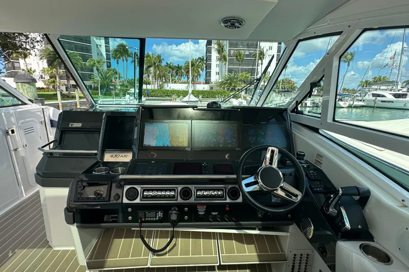  Yacht Photos Pics 2023 Formula 430 All Sport Crossover helm with advanced navigation displays and controls.