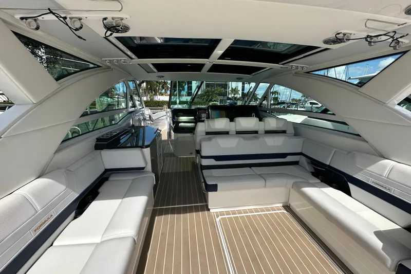  Yacht Photos Pics 2023 Formula 430 All Sport Crossover interior with luxurious seating and modern design.