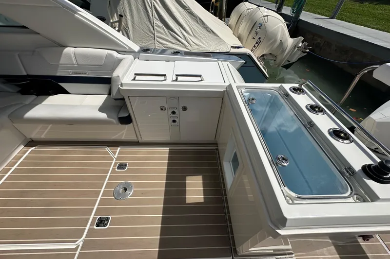  Yacht Photos Pics 2023 Formula 430 All Sport Crossover boat interior with seating and fishing station.