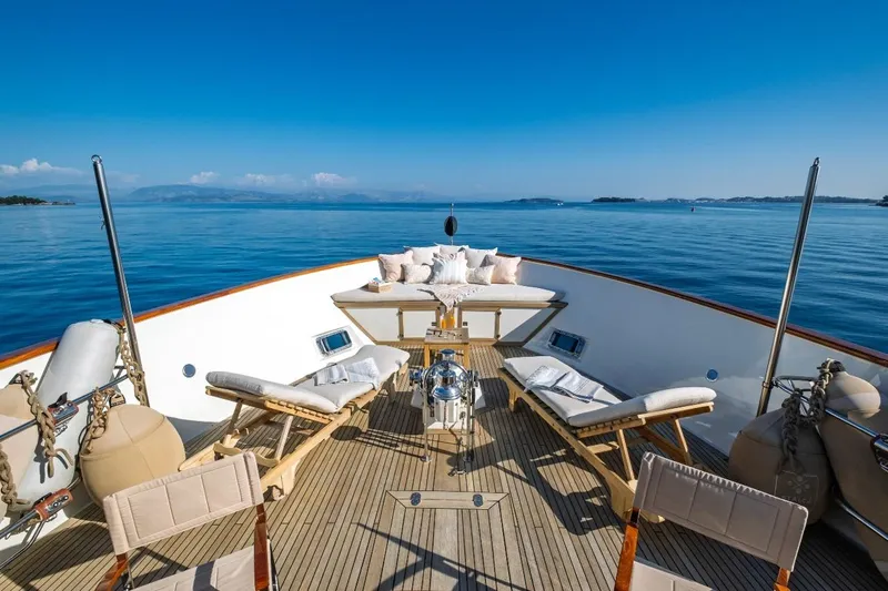 Stalca Yacht Photos Pics Luxurious Visch 001 yacht deck with sun loungers, table, and ocean view, 1971 model.