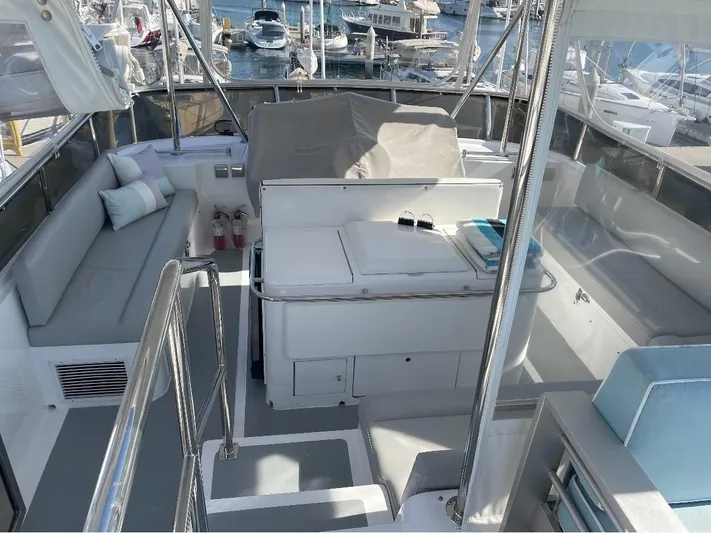Sand Castle Yacht Photos Pics Luxurious 1996 Johnson 70 Euro yacht interior with seating and marina view.