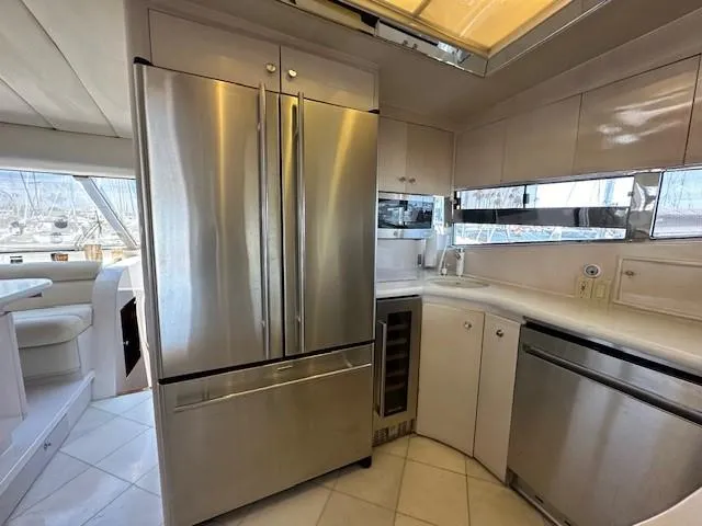 Sand Castle Yacht Photos Pics Luxurious yacht kitchen with stainless steel appliances, Johnson 70 Euro, 1996 model.