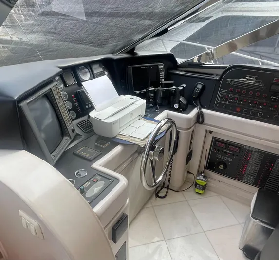 Sand Castle Yacht Photos Pics Cockpit of a 1996 Johnson 70 Euro yacht with navigation equipment and controls.