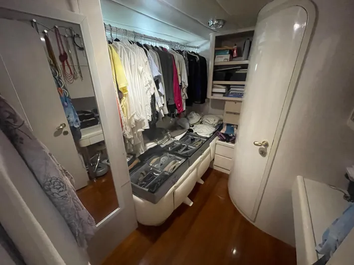 Sand Castle Yacht Photos Pics Closet interior on 1996 Johnson 70 Euro yacht with clothes and storage.