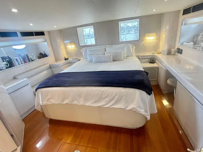 Sand Castle Yacht Photos Pics Luxurious bedroom interior of 1996 Johnson 70 Euro yacht with elegant furnishings.