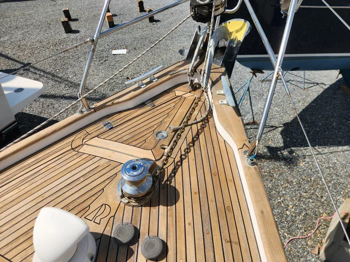 Vivace 1 Yacht Photos Pics Deck of 2002 Hallberg-Rassy 36 MKII sailboat with anchor chain and winch.